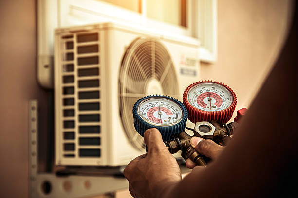 Professional Hvac technician working in Dennis Port, MA